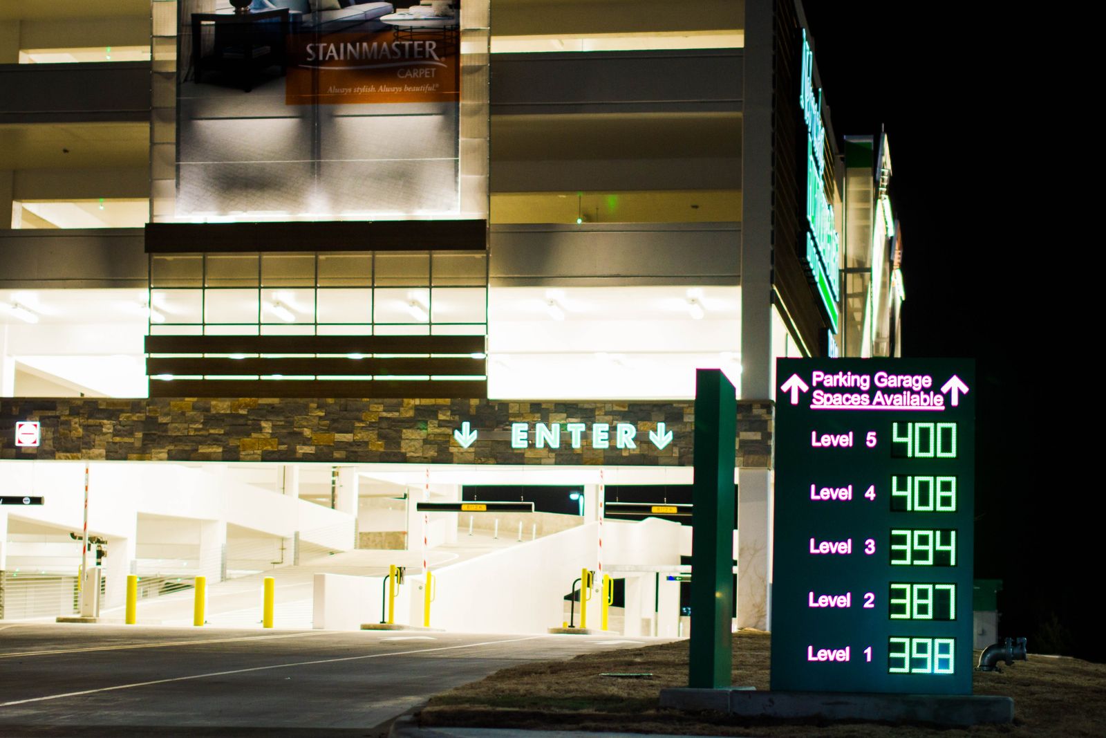 image of parking garage with the number of spots available on each floor.